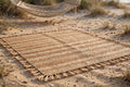 Handwoven beach and picnic mat spread out on a Vancouver Island beach