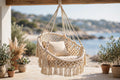 Yucatán hammock chair, a handwoven cotton swing seat hanging on a porch in Nanoose Bay, BC