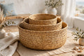 Set of three handwoven storage baskets from Bali on a shelf in a BC home