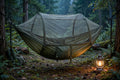 Standalone hammock bug net with fine no-see-um mesh over a camping hammock