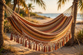 Colombian classic double hammock handwoven in cotton hanging between cedar trees in Nanoose Bay, BC