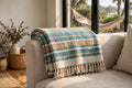 Handwoven cotton throw blanket draped over a hammock in Nanoose Bay, BC