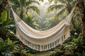 Undyed natural cotton hammock hand-loomed in Bali hanging in a tropical garden
